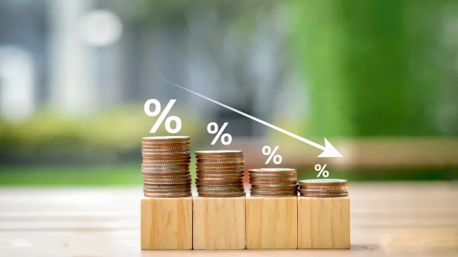 percent sign and coins